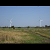 There's so little wind today the most of the turbines aren't turning. These two were both turning sl...