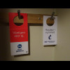 As well as the "Do not disturb" sign, there's also a sign to warn cleaners that there's a ...
