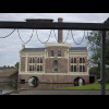 This very much looks like a pumping station but the sign on the other side of it says that it's a re...