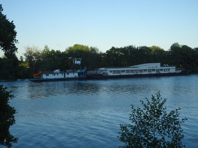 A funny-looking barge and pusher boat.