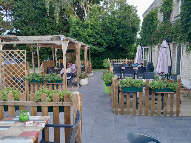 My hotel's outdoor dining area. The meal here was extremely good and not too expensive. The thing wh...