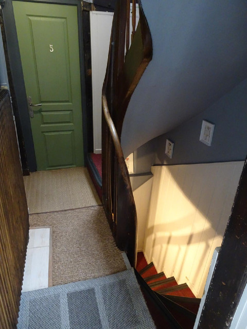 My room is the only room on the top floor, which means that I have to go up both these flights of st...