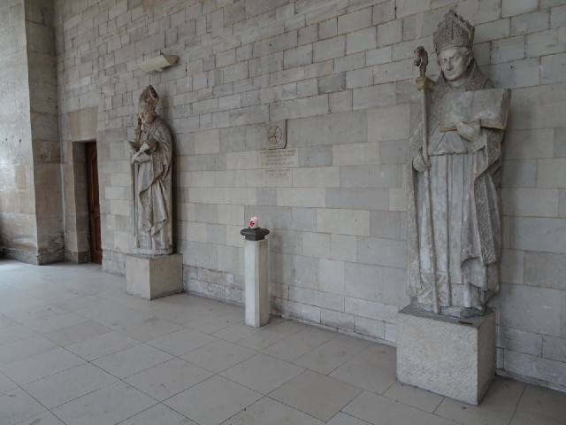 Inside the Abbey church. The inscription on the wall dates from 1969 and is to do with the connectio...