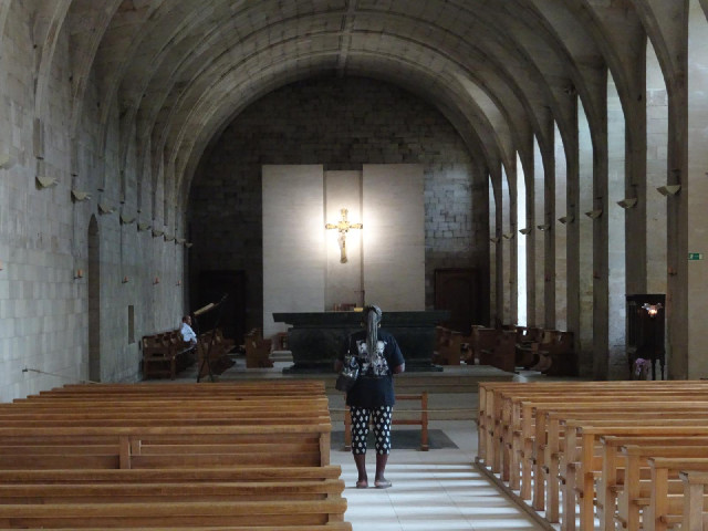 Inside the Abbey church. One the left is one monk who has got here early for vespers. I think I woul...