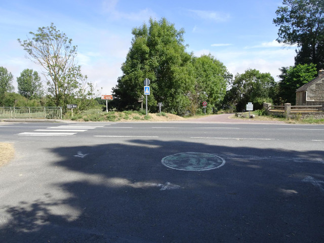 A mini roundabout just for bikes. It's off the side of the main road so cars just ignore it. It's su...