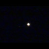 Jupiter and two of its moons. This year, I didn't bring ...