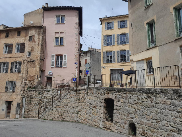24th of February Road is the gap to the right of the pink building.