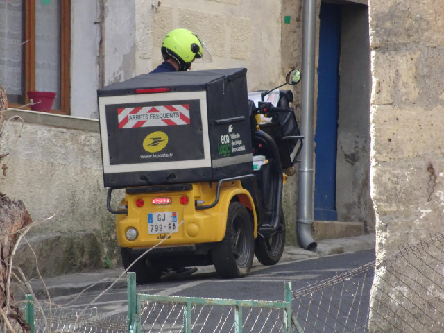 A postal delivery vehicle.