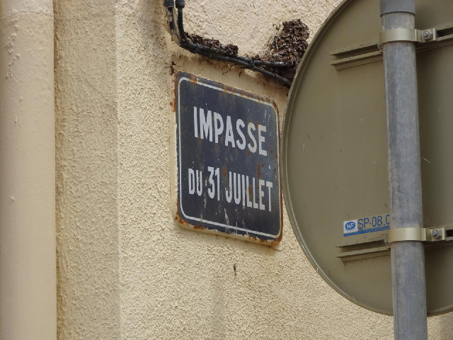 Unfortunately, it only has one name sign and I can't get a clear picture of it because of the big ro...