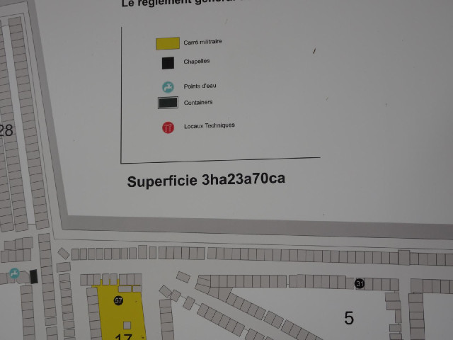 That's a very odd way of saying that the cemetery covers an area of 32370 square metres.