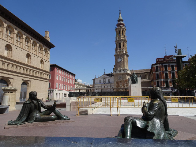 The statue on the pedestal in the background is the painter Francisco Goya, who grew up in the city....