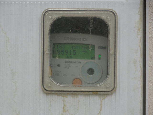 From where I've parked, I can read this house's electricity meter.
