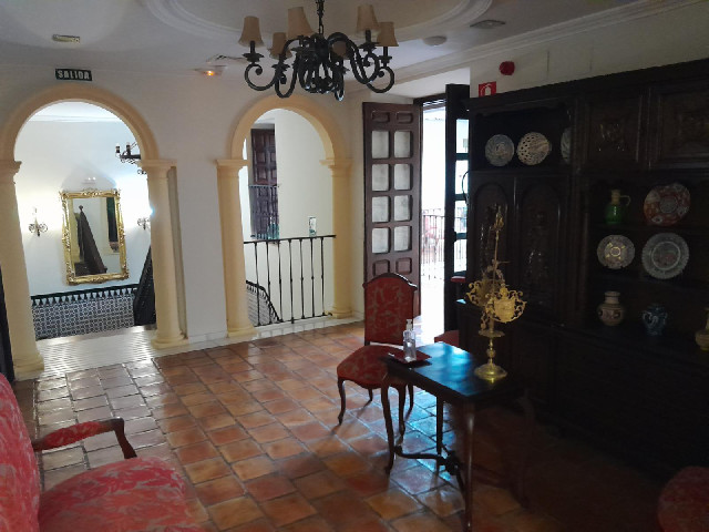 It's reminiscent of that palace where I stayed in Slovakia, but on a much smaller scale and in the h...