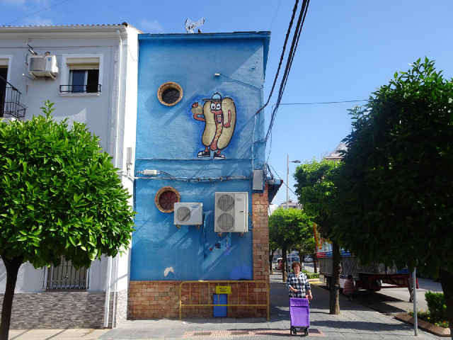 The wall opposite the one with the name sign looks like this.