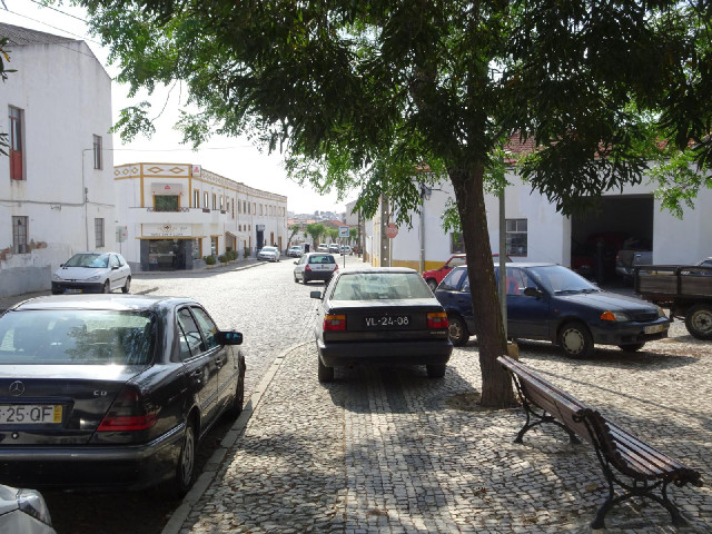 Vidigueira. The building with the diamonds around the top is my hotel. The building on the right is ...
