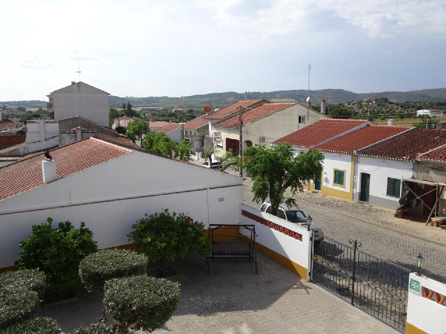 I have a balcony with this view but it's too hot to sit out there. In fact I'm going to have to draw...