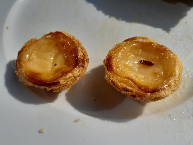 Past&eacute;is de Nata, also known as Past&eacute;is de Belem. I think these are the flaky custard t...