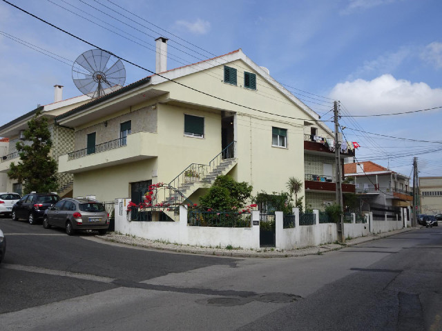 A house with a big dish.