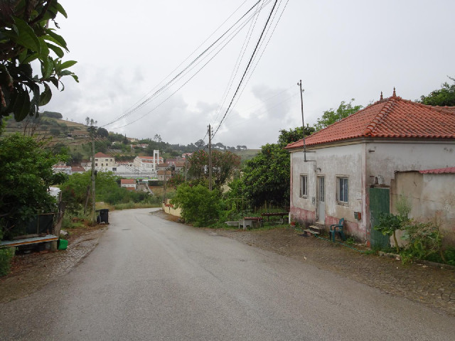 The view in the other direction, down 10th of April Road.