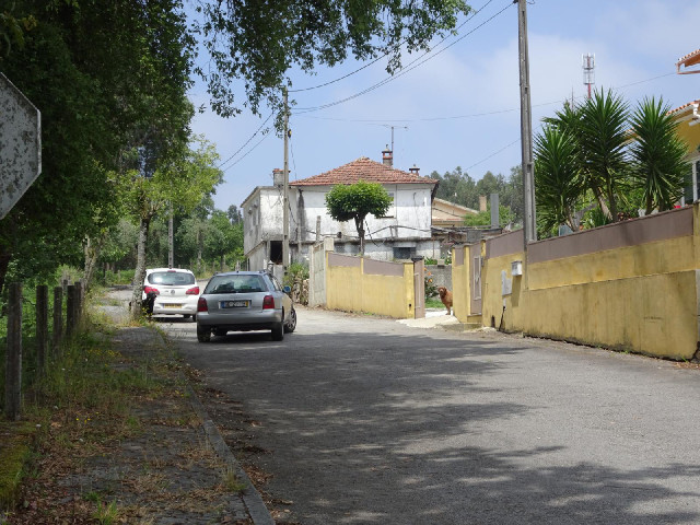 The owner of this house in 19th of May Road is just returning home so the automatic gate has opened ...