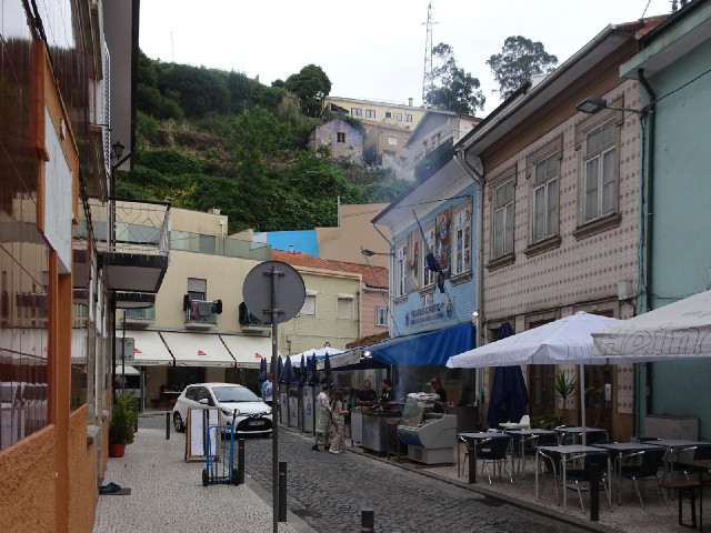 Several of the restaurants here are barbecuing on the pavement. The air smells of chargrilled meat.