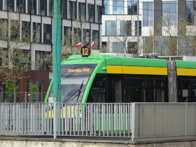 Here's a tram with flags flying.