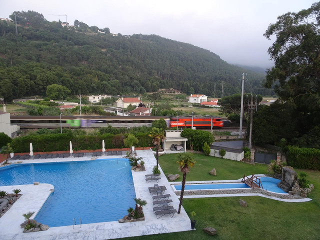 Here's a train, and also a sort of jaccuzi has been turned on in the pool. As well as passenger trai...