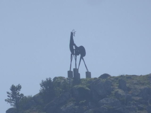 A silhouette on a hilltop. It's on the Portugese side of the river so it isn't a bull.