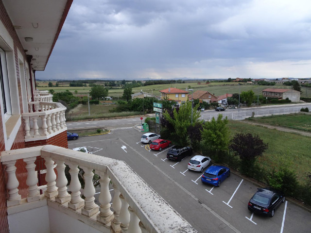The floor of this balcony slopes downwards away from the building to aid drainage, which makes it fe...