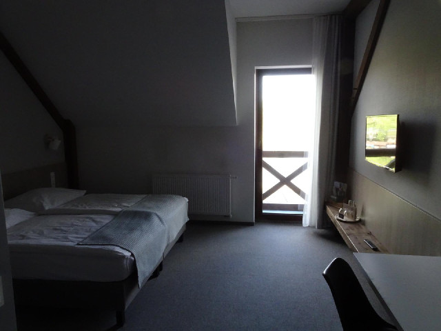 My room. It has real glasses and a kettle, but no iron.