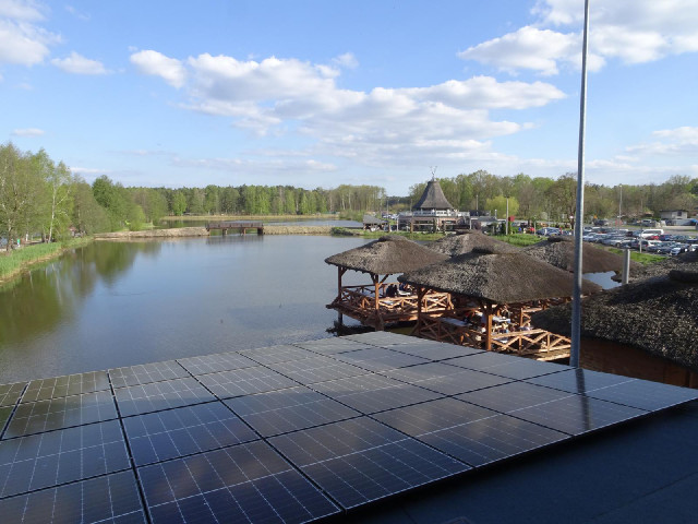 My room overlooks the lake and the restaurant terrace. I can hear what sound like peacocks.