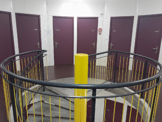 My floor is just 14 rooms, a lift and a fire escape around the staircase.