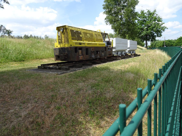 Next to the sports ground is this old train. The white wagons are now flower beds. My guess is that ...
