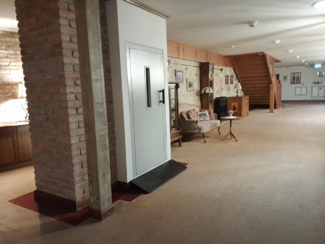 The corridor leading to my room. I think the door might be a service lift. It's not the passenger li...