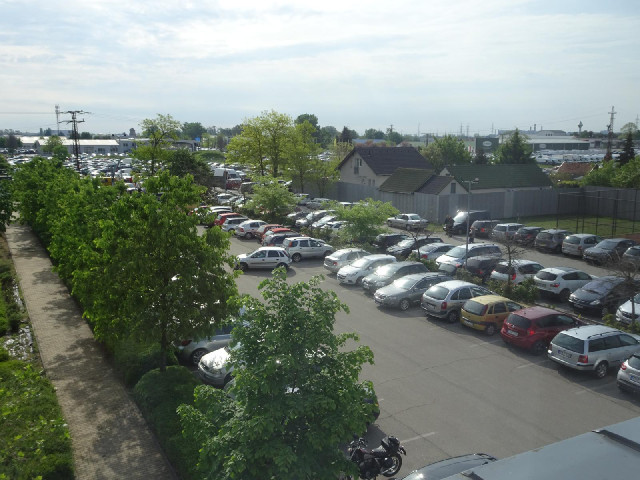 There are a lot of cars here now. I think it's for some sort of market. I saw lots of people carryin...