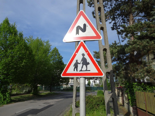 The people on the sign are funny shapes.