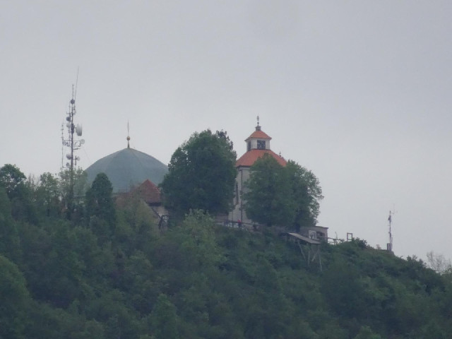 A restaurant on top of a hill about 2 km away.