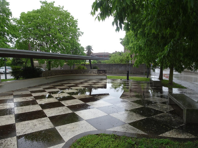 It has a car park and this little paved area called Guido Rossa Square, named after somebody who was...