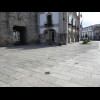 Metal markers in the road. The left one indicates the route of the Camino. The right one points towa...