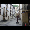 The signs are in Spanish on the North side of the street and in Basque on the South side.