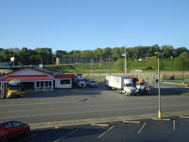 The road along the base of the embankment is one of the slip roads which ends I-30. The bike shop is...