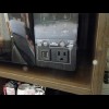 This microwave oven has a mains socket on it so that you can plug another appliance into it. USB cha...