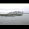 The green land in the foreground is Governors Island.