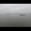 A barge full of rubbish in front of Staten Island. I have heard that a large part the land of Staten...