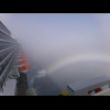 A fog rainbow.