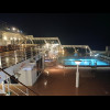 The pools and seating area in the stern. These external staircases lead all the way to the top decks...