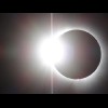 The "diamond ring". And look, there's a solar flare on the bottom edge. That was visible t...
