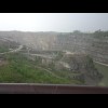 A stone quarry, seen from a road which is signed as part of a cycling route called the Mississippi R...