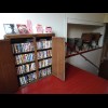 Next to that display of old school desks there is a selection of DVDs and microwave popcorn, which g...