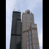 The black tower is officially currently called the Willis Tower but still known by most people in Ch...